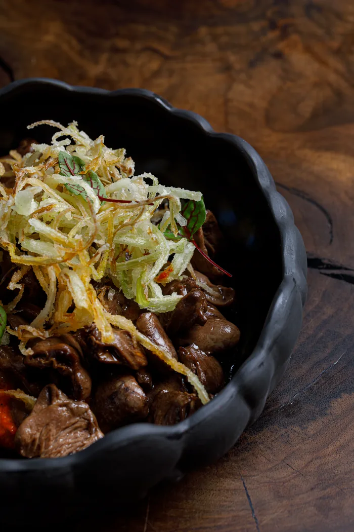 Chicken hearts with crispy leek chips