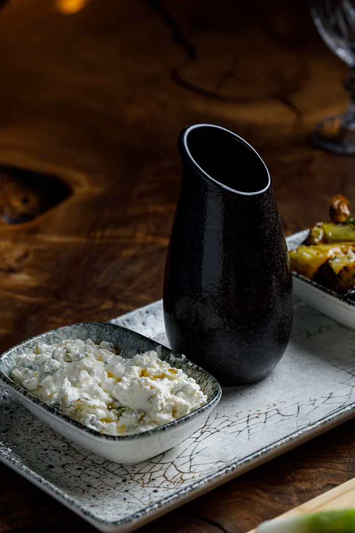 Farm cheese served with herbs